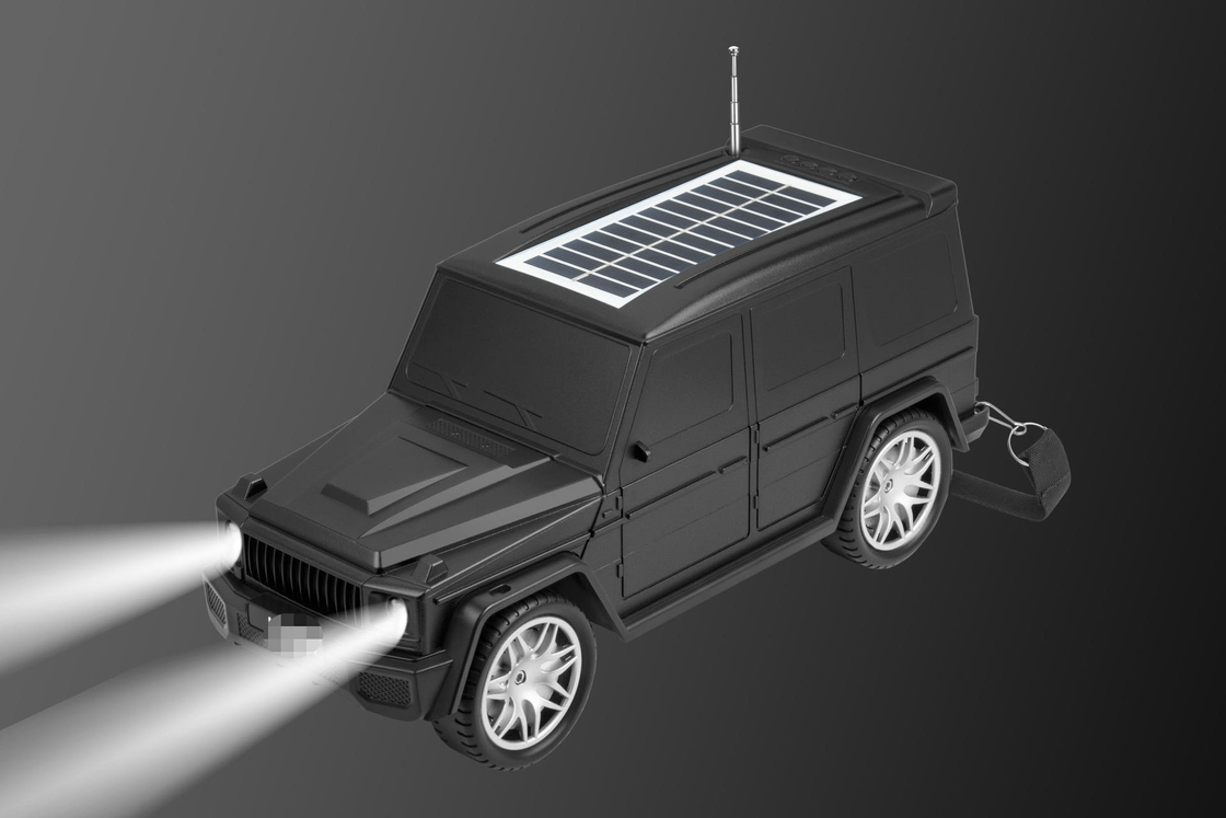 Klasyczny głośnik Bluetooth w kształcie samochodu łączy w sobie latarkę słoneczną i funkcje radiowe do podróży domowych na zewnątrz